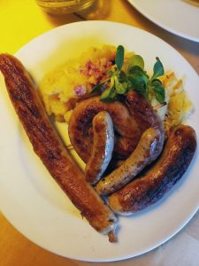 a plate of several sausages